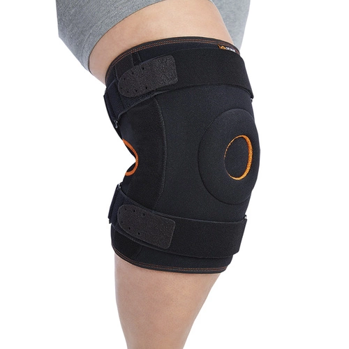 Wraparound knee support with biaxial joints and metal support